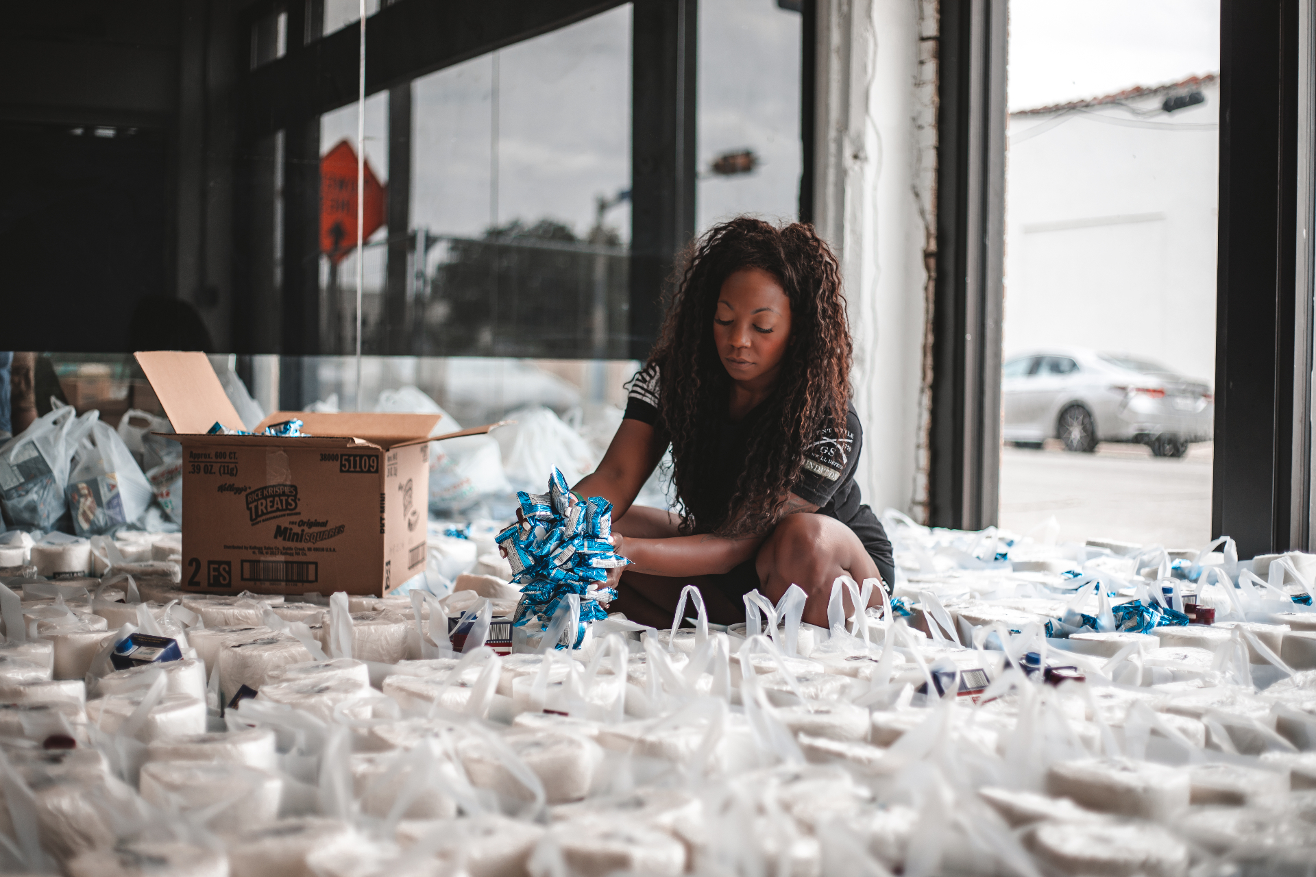 Tiffany Orner preparing hospitality care packages for junior enlisted military families in San Antonio, Texas